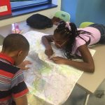 Students reading a map