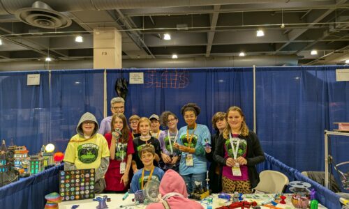 Group shot of students and Ms. Martin at the 3DPrintopia Expo